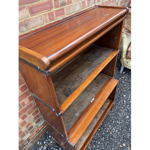 312 - A open fronted three section globe wernicke bookcase