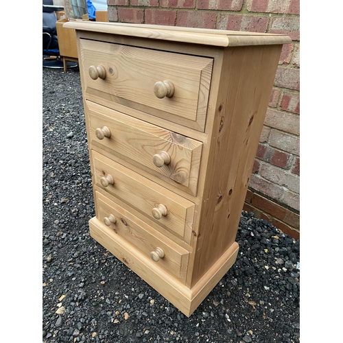 326 - A solid pine chest of four drawers