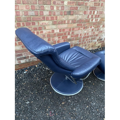 331 - A blue leather reclining armchair, raised on a chrome base, together with footstool