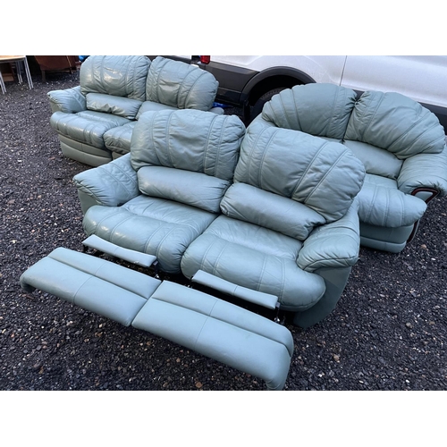 339 - A set of three green leather sofas, two of which have reclining seats and footrests