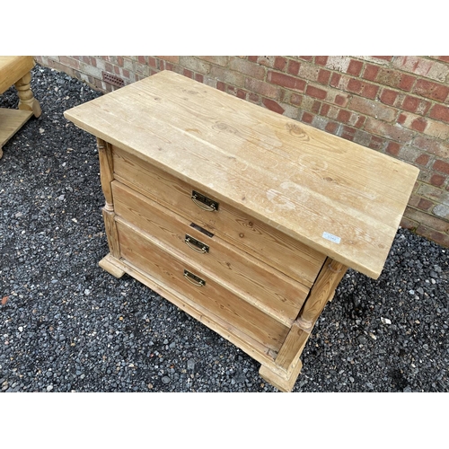 342 - A continental pine chest of three drawers