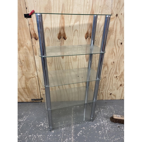 39 - A modern glass shelving unit