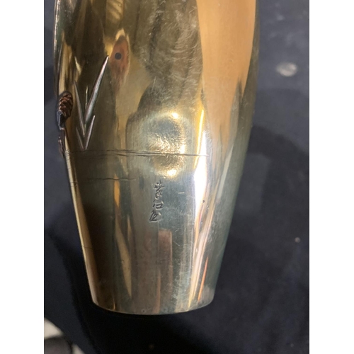 391 - Japanese brass vase depicting Mount Fuji and signed height 15 cms