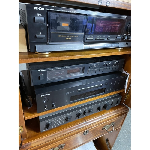 43 - A stereo stack consisting of a Thorens TD 160 record deck, denon DRM 700 tape deck, Rotel RT 850 al ... 