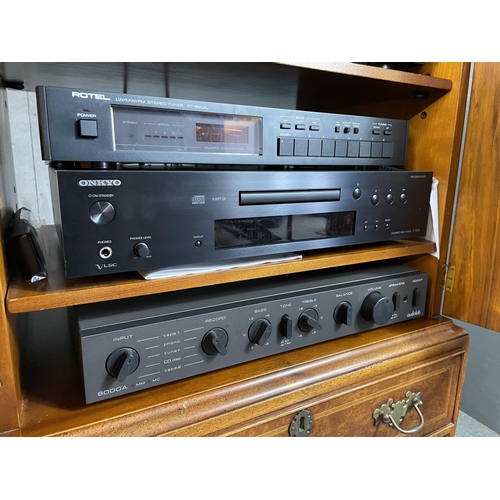 43 - A stereo stack consisting of a Thorens TD 160 record deck, denon DRM 700 tape deck, Rotel RT 850 al ... 