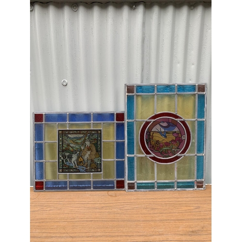 438 - Four leaded stained glass panels 53 x 45, 61 x 59, 53 x 46, 60 x 46 cms