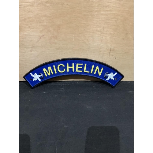 511 - Michelin cast iron plaque, approx 40cm long