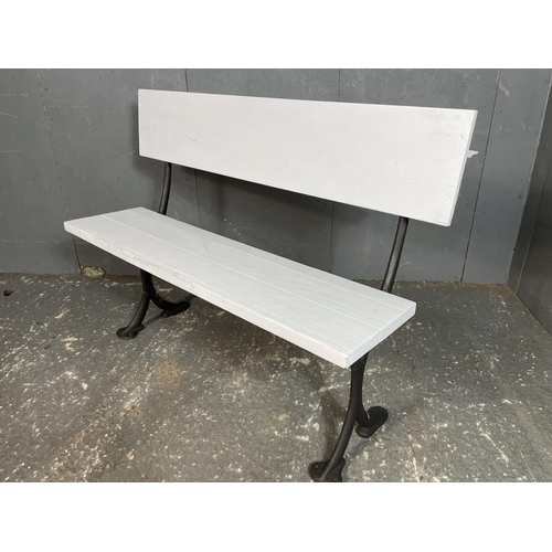 53 - A cast iron garden bench with white painted seat produced by Sarason foundry Glasgow 140 wide
