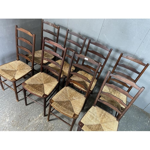 54 - A set of eight ladder back dinning chairs with Rush seats