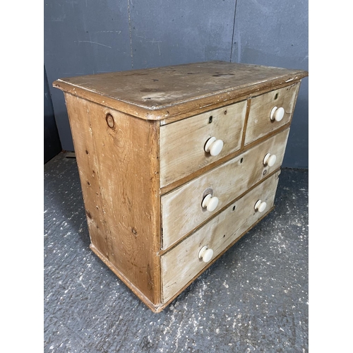 55 - An antique pine chest of four drawers with white ceramic knobs 86 x 45 x 70