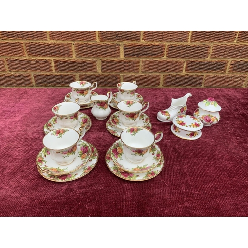 583 - 6 Royal Albert Old Country Roses trios, chip to rim on 1 cup and milk jug and 3 pieces cottage rose ... 