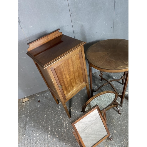 60 - A mahogany bedside, two swing mirror, ocassional table and a lamp stand