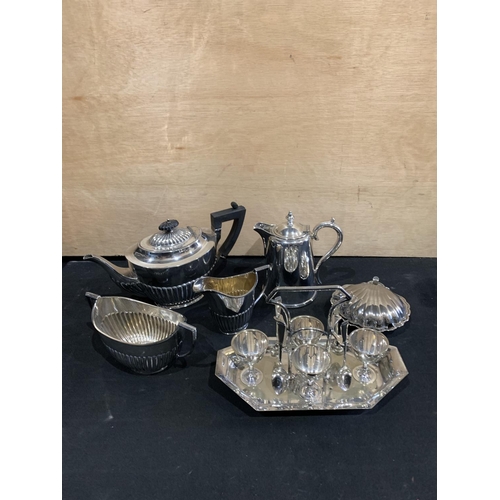 721 - 3 piece plated teaset, cruet, jug and shell fish