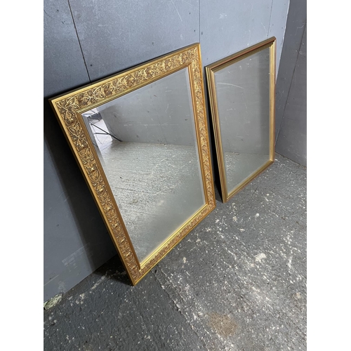 73 - Two large gilt framed mirrors largest mirror measure: 76 x 107