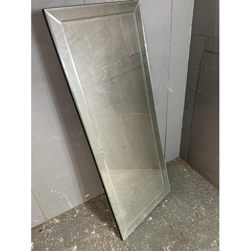 74 - A large bevelled edge dressing mirror 59 x. 150