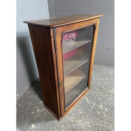76 - A mahogany glazed cabinet 60 x 25 x 85cm
