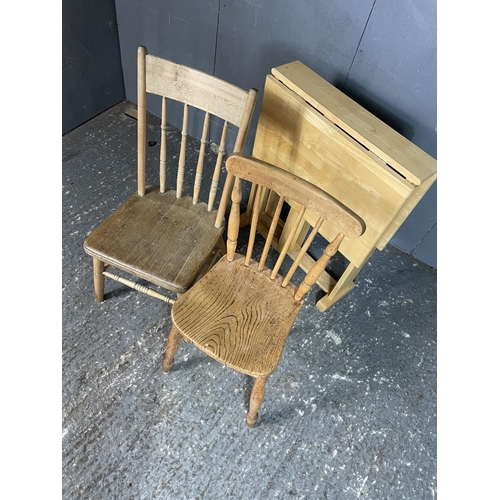 81 - Two kitchen chairs and a folding table