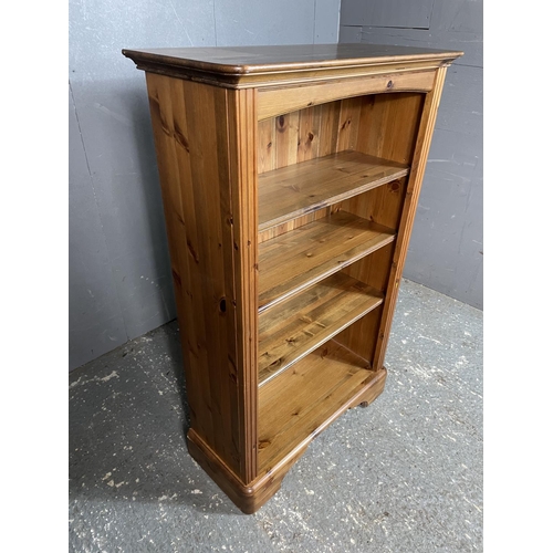 9 - A solid pine open fronted bookcase with adjustable shelves 76x33x120