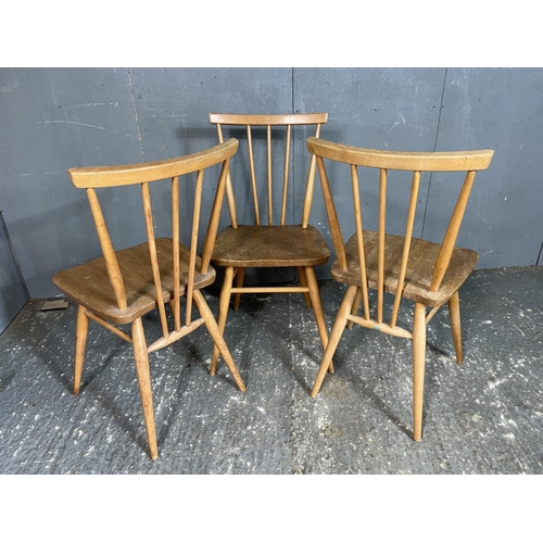 91 - A set of three Ercol stick back chairs