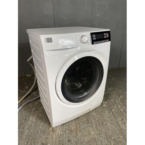 95 - A John Lewis washer dryer (less than 1 year old)