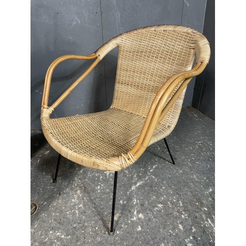 31 - A retro wicker chair together with a stickstand and a plant stand