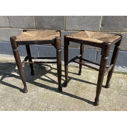 19 - A pair of country oak stools with Rush seats 36x30x55