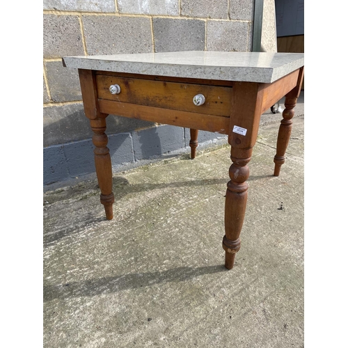 34 - A single drawer pine kitchen table fitted with a Formica top 75x110