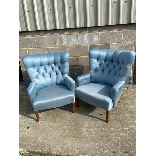 35 - A pair of blue upholstered button back bedroom chairs