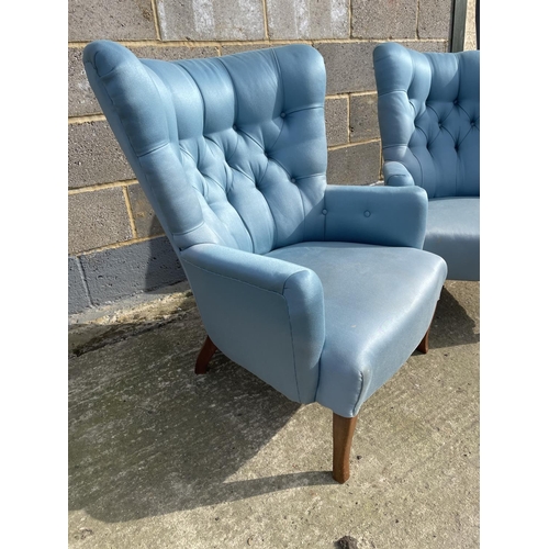 35 - A pair of blue upholstered button back bedroom chairs