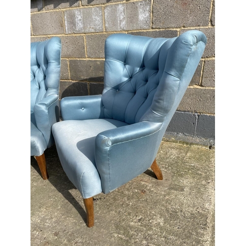 35 - A pair of blue upholstered button back bedroom chairs