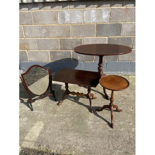 38 - A Victorian mahogany oval snap top table (af) together with two mahogany occasional tables and a swi... 