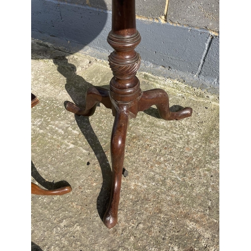 38 - A Victorian mahogany oval snap top table (af) together with two mahogany occasional tables and a swi... 