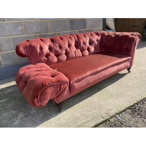 8 - An Edwardian pink buttoned back chesterfield sofa 185cm wide