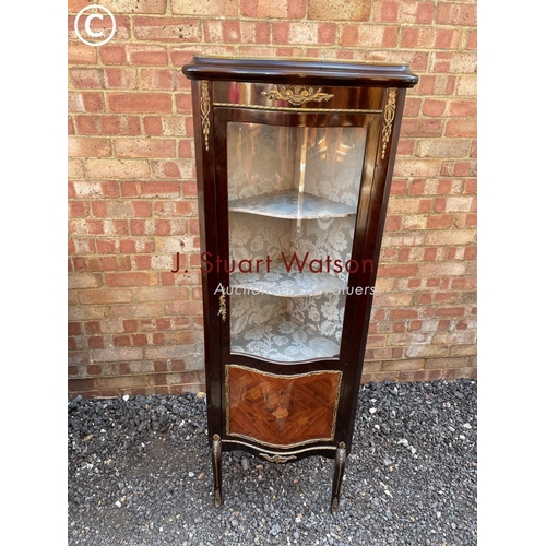 1 - A continental style reproduction corner cabinet with inlay and brass mounts