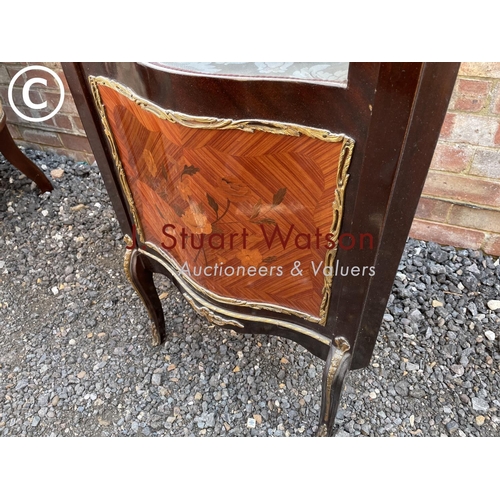 1 - A continental style reproduction corner cabinet with inlay and brass mounts