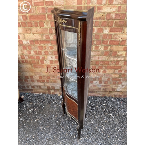 1 - A continental style reproduction corner cabinet with inlay and brass mounts