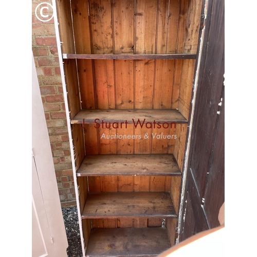 21 - A painted pine laundry cupboard together with a white painted hall wardrobe