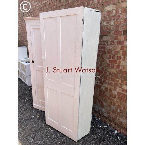 21 - A painted pine laundry cupboard together with a white painted hall wardrobe