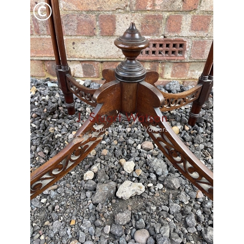 26 - An ornate circular Mahogany occasional table