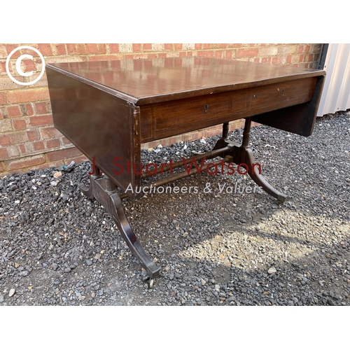 3 - A large Georgian Mahogany sofa table fitted with two drawers and two dummy drawers 92x83x70