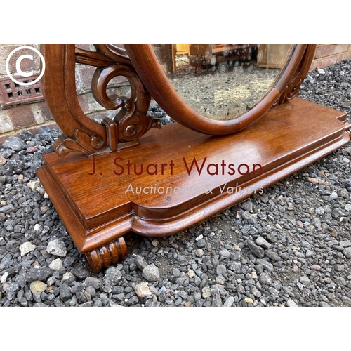 4 - A large Victorian mahogany swing mirror