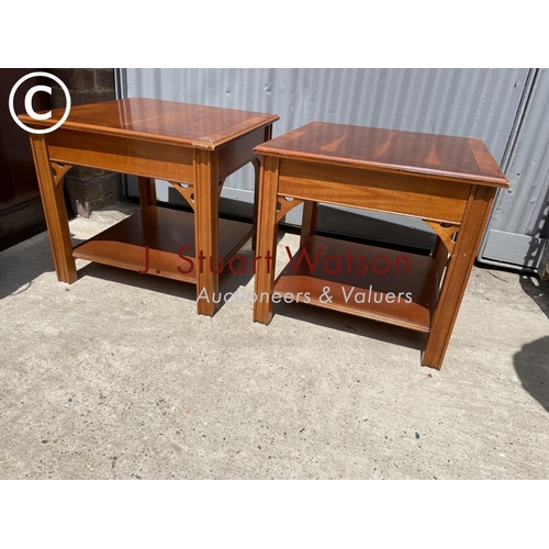 47 - A pair of yew lamp tables