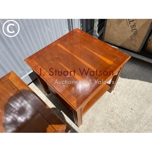 47 - A pair of yew lamp tables