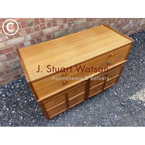 6 - A Nathan teak sidebaord with four drawers over two cupboard doors 102x44x75