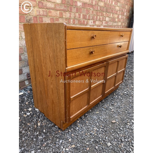 6 - A Nathan teak sidebaord with four drawers over two cupboard doors 102x44x75