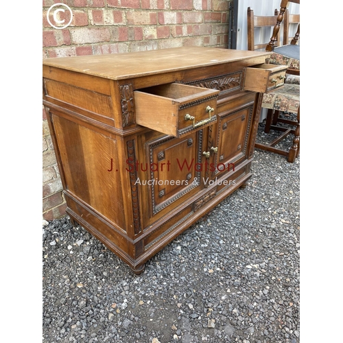 64 - Continental carved sideboard