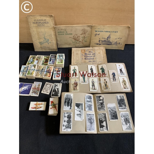 712 - Complete cigarette card albums, loose teacards and others