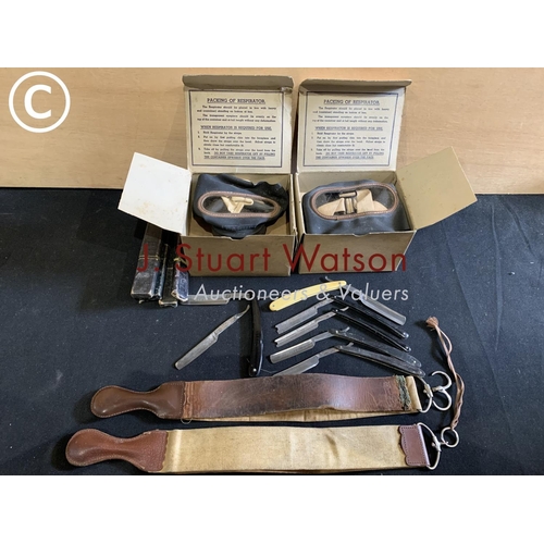 714 - 2 boxed respirators, 7 cut throat razors and 2 leather strops