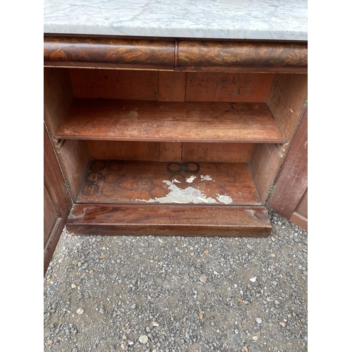 32 - A regency mahogany marble top cheffioner with mirror back 97x47x125