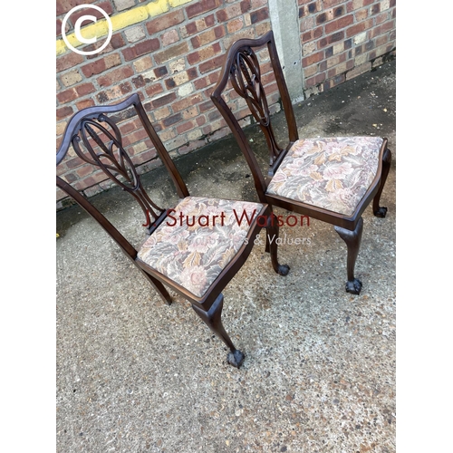 266 - Pair of mahogany ball and claw chairs together with a pair of balloon back chairs